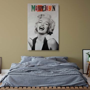Timeless portrait of Marilyn Monroe in mid-laugh with black and white finish and cutout letter design perfect for retro woman wall styling.