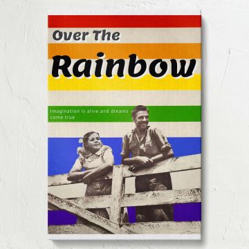 Over the rainbow-themed wall canvas showcasing a vintage photo of two smiling individuals against a backdrop of vibrant rainbow stripes, blending cheerful colors and nostalgic design to create an uplifting and visually striking piece of home decor.