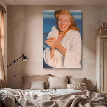 Marilyn Monroe wall art print featuring the beloved actress in a classic pose, wearing a white bathrobe and smiling. This black and white Marilyn Monroe print adds sophistication to any home, office, or bedroom decor. Printed on high-quality canvas, it's 