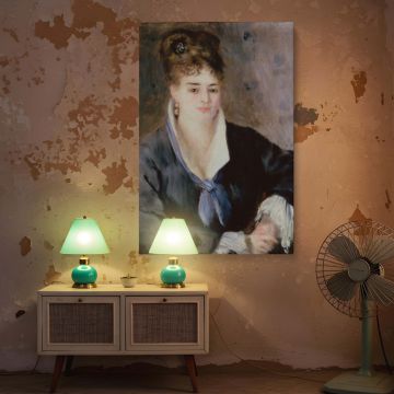 Featuring Renoir's soft painterly touch, this wall canvas of Woman in Black draws attention to the poised figure of a woman adorned with gold earrings and a black dress accented with a pastel blue ribbon. The subtle blush in her cheeks and the nuanced lig