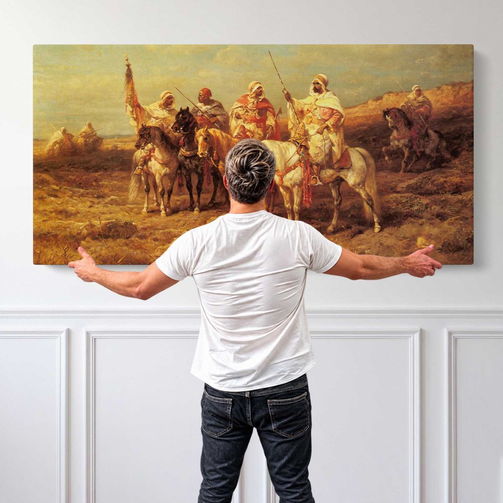 Arab Horsemen by a Watering Hole by Adolf Schreyer — single-panel canvas shown behind a standing person for scale
