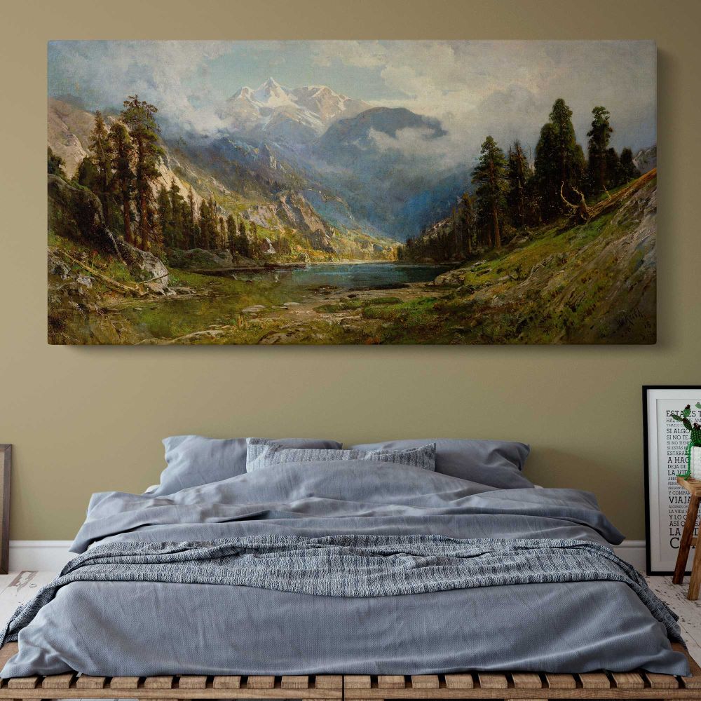 California Pines by William Keith — single-panel canvas above a bed with blue bedding