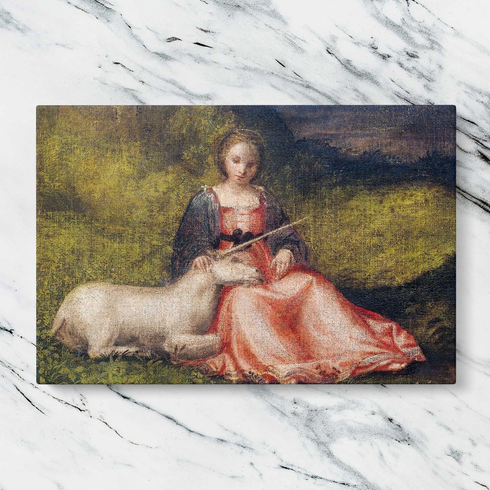 Woman with a Unicorn canvas artwork displayed on a marble background