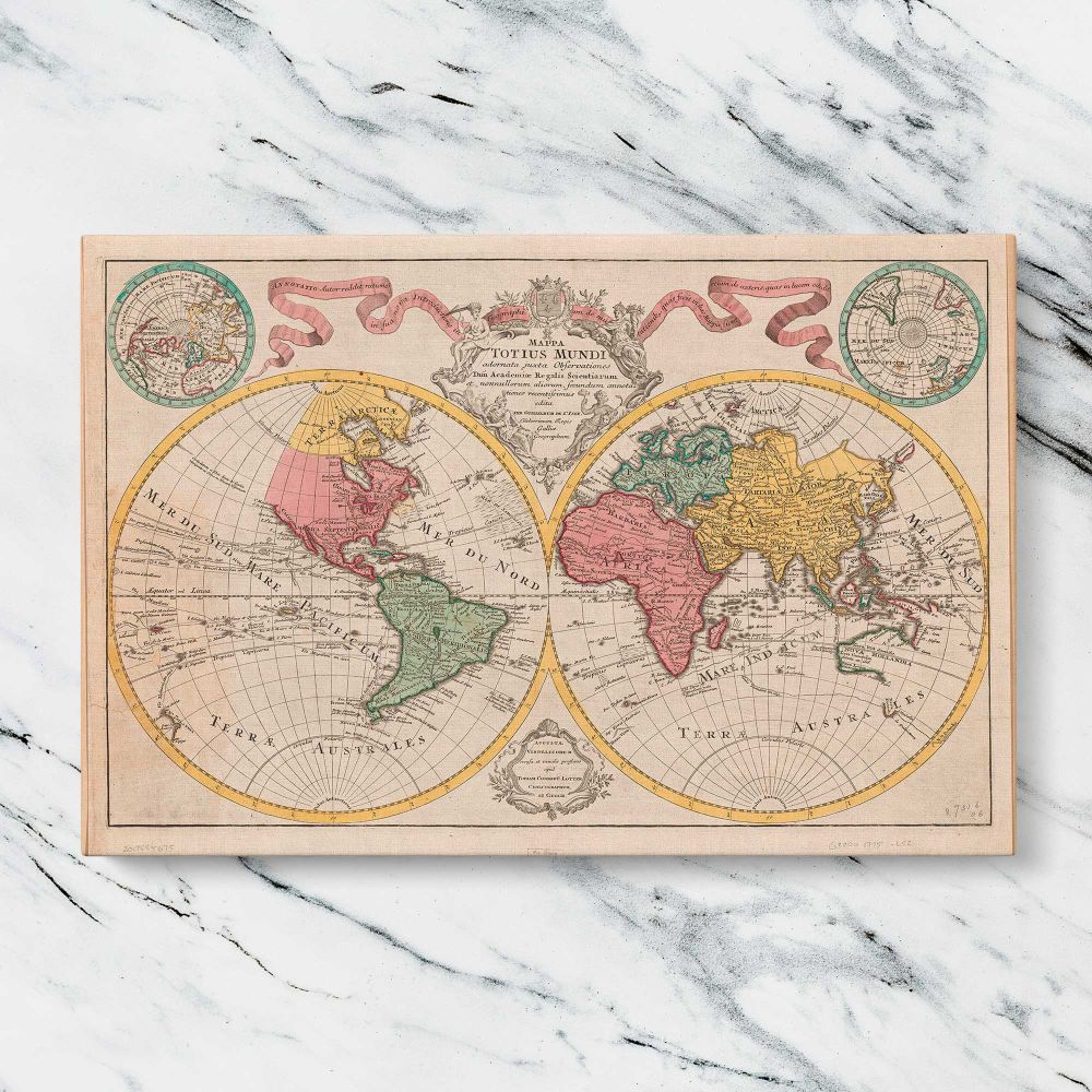 Pastel Double Hemisphere World Map canvas artwork displayed on a marble background