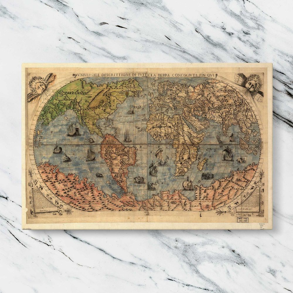 Antique World Map 1565 canvas artwork displayed on a marble background
