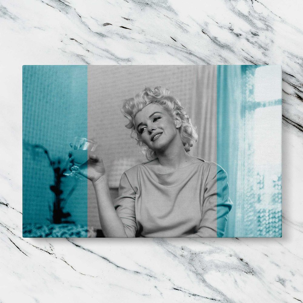 Marilyn Monroe Smiling Turquoise Portrait canvas artwork displayed on a marble background