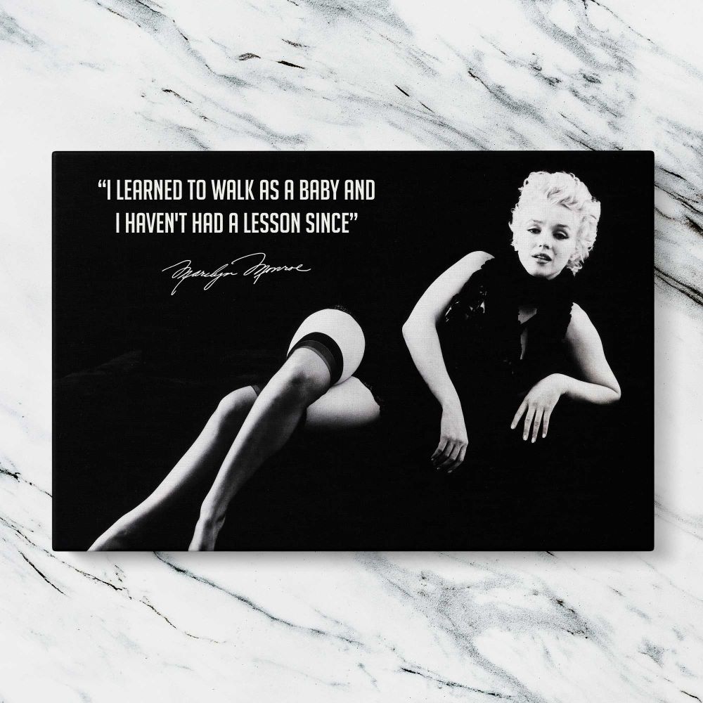 Marilyn Monroe Black and White Quote Portrait canvas artwork displayed on a marble background