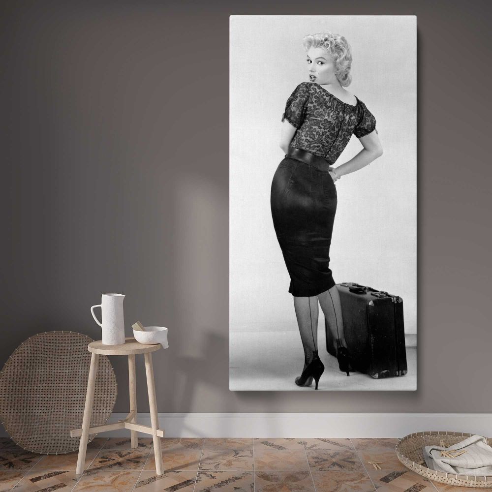 Marilyn Monroe Bus Stop Portrait with Suitcase canvas wall art displayed in a contemporary room
