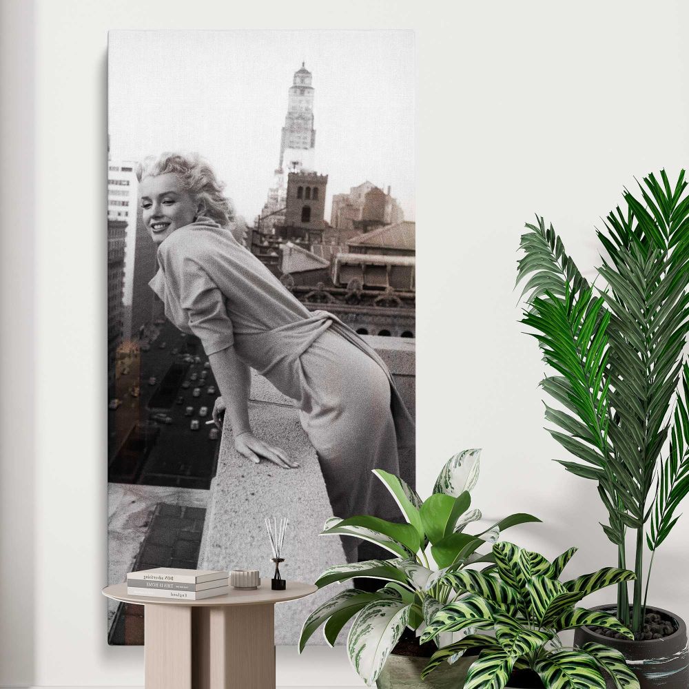 Marilyn Monroe on a New York Balcony canvas print displayed in a modern interior