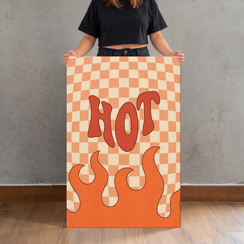 Hot Stuff Orange Checkerboard Typography canvas print, held for scale