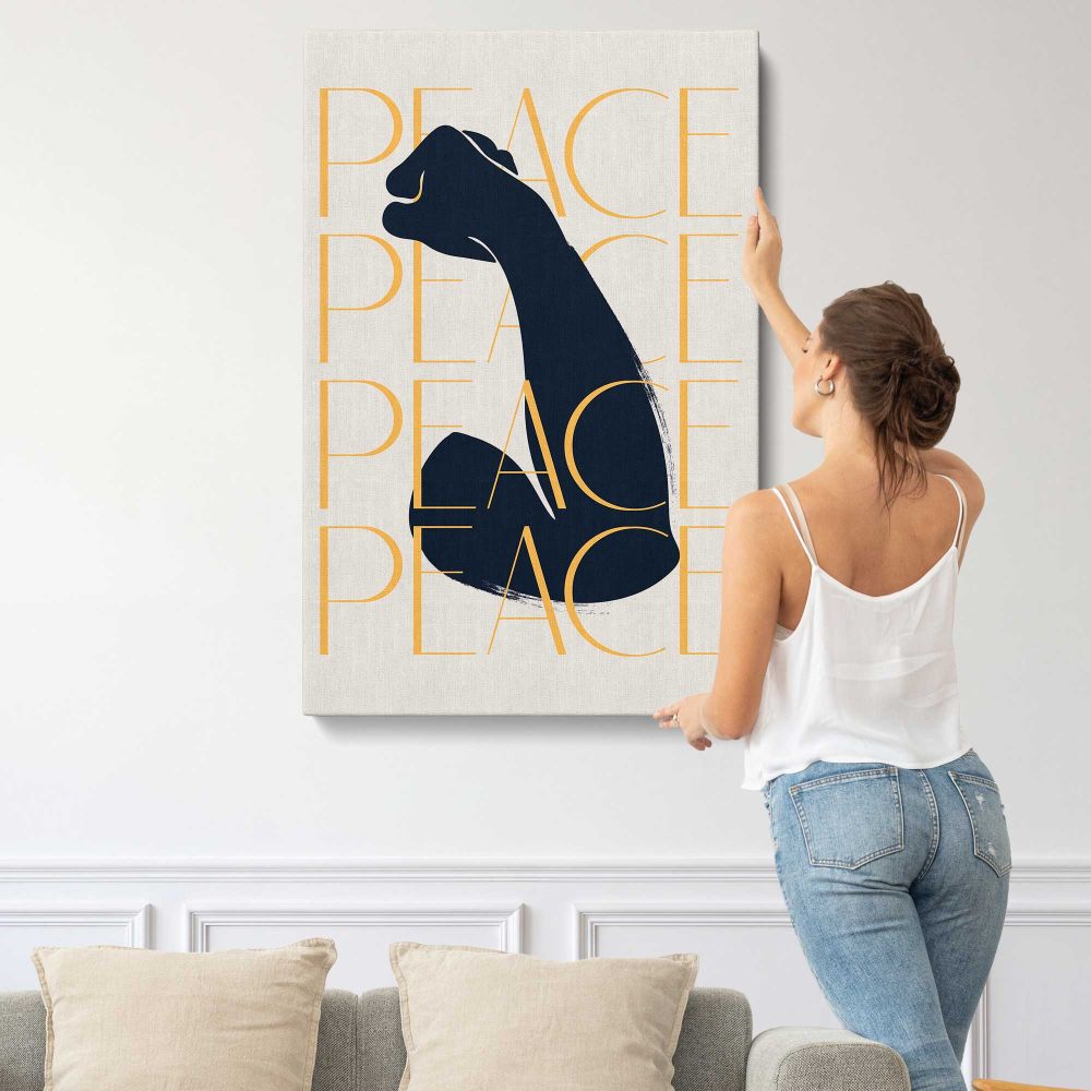 Black Cat with Gold Peace Typography canvas print, displayed on a wall