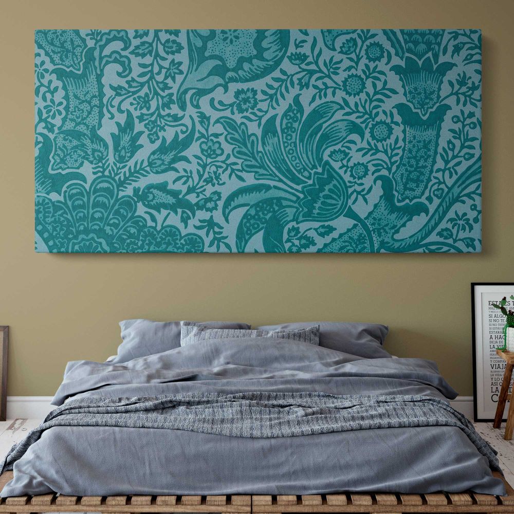 Indian Floral Pattern in Teal by William Morris — single-panel canvas above a bed with blue bedding