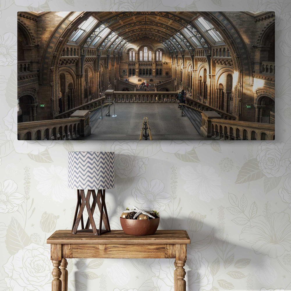 Sunlit Hall at the Natural History Museum — single-panel canvas above a console table