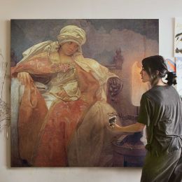 Seated Woman by Lamplight Square Canvas Wall Art
