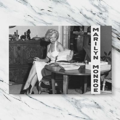 Marilyn Monroe Seated at a Table Canvas Wall Art Print