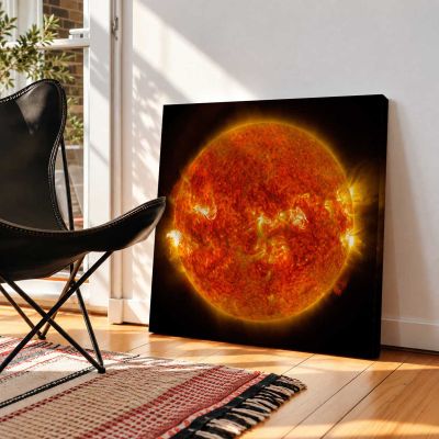 NASA's Solar Dynamics Observatory captured images of the sun emitting a mid-level solar flare Square Canvas Wall Art