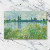 Banks of the Seine at Vetheuil canvas artwork displayed on a marble background