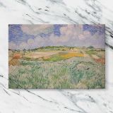 Wheat Fields beneath a Cloudy Sky canvas artwork displayed on a marble background