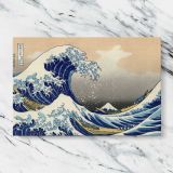 The Great Wave off Kanagawa canvas artwork displayed on a marble background