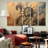 Statue of Liberty beneath Golden Clouds canvas wall art in room setting 5