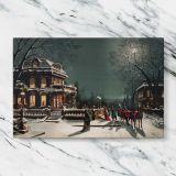 Christmas Eve Village Scene canvas artwork displayed on a marble background