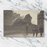 Trafalgar Square Lion Vintage Photograph canvas artwork displayed on a marble background