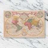 Pastel Double Hemisphere World Map canvas artwork displayed on a marble background