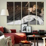 Marilyn Monroe Reclining in a Black Dress canvas wall art in room setting 6