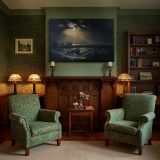 Fishermen at Sea canvas wall art in room setting 7