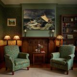 The Shipwreck canvas wall art in room setting 7