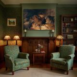 Deer and Deer Hounds in a Mountain Torrent canvas wall art in room setting 7