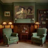 Two Young Men with a Drawing Board canvas wall art in room setting 7