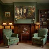Classical Figures in a Mythological Garden canvas wall art in room setting 7