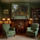 Wooded Landscape with Travellers and Horses canvas wall art in room setting 7