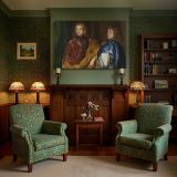 Two Young Noblemen in Silk Cloaks canvas wall art in room setting 7
