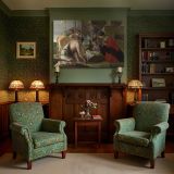 Adoration of the Shepherds in a Classical Setting canvas wall art in room setting 7