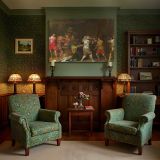 Armoured Figure and Musicians in a Banquet Hall canvas wall art in room setting 7