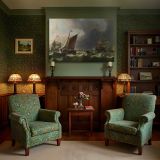 Sailing Ships beneath Dark Storm Clouds canvas wall art in room setting 7