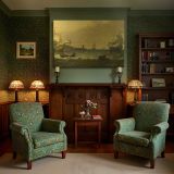 Harbour Ships beneath a Golden Sky canvas wall art in room setting 7
