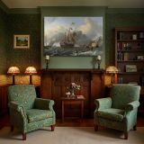 Tall Sailing Ship and Small Boats canvas wall art in room setting 7