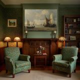 Sailing Boats and Rowing Boats in a Calm Harbour canvas wall art in room setting 7