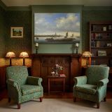 Estuary Boats and Distant Church Tower canvas wall art in room setting 7