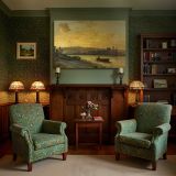 River Town in Golden Evening Light canvas wall art in room setting 7