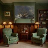Wooden Sailing Ship in a Storm canvas wall art in room setting 7