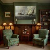 Sailing Fleet on a Choppy Sea canvas wall art in room setting 7