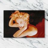 Marilyn Monroe Smiling with Red Lips canvas artwork displayed on a marble background