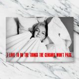 Marilyn Monroe in Bed with Red Quote canvas artwork displayed on a marble background
