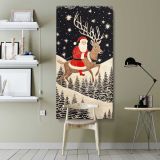 Santa Riding a Reindeer Under the Stars canvas wall art shown in a modern interior