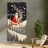 Santa Riding a Reindeer Under the Stars three panel canvas print in a contemporary interior