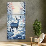 Blue Deer in a Snowy Forest three panel canvas print in a contemporary interior